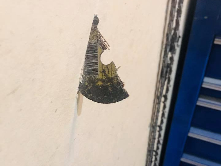 The other piece of the surface grinding disc struck the wall. Source: Twitter